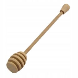 Lingura de lemn tradițională pentru miere, cu cap canelat, este un ajutor practic și elegant la servirea mierii lichide.