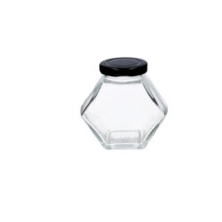 Borcan hexagonal din sticlă 100 ml cu capac negru pentru conserve sau depozitare.